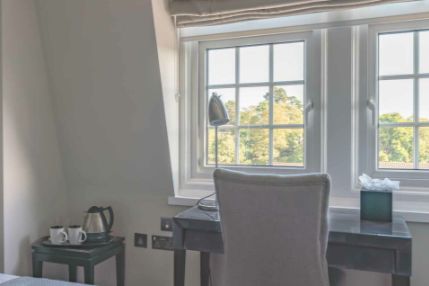 Cosy-double-bedroom-view-2-1536x636